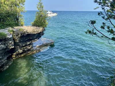 Aerial view of the Washington Island coastline and the clear blue waters of Lake Michigan