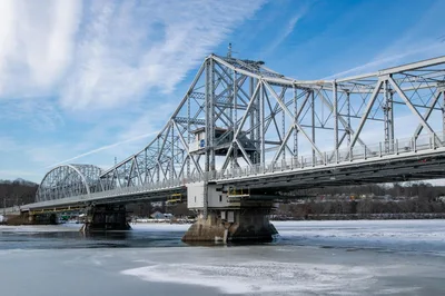 The historic East Haddam Swing Bridge over the icy Connecticut River in winter