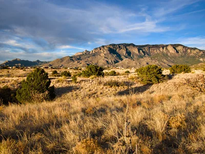 Aerial view of the Sandia Mountains and high desert landscape in Albuquerque, New Mexico.