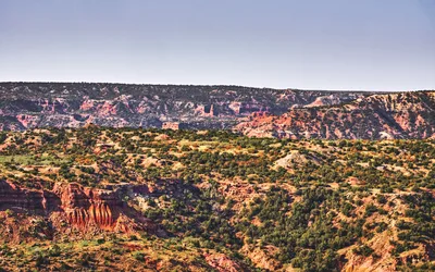 Aerial view of Palo Duro Canyon State Park near Amarillo, Texas, featuring 'The Lighthouse' rock formation.