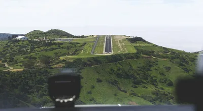 Aerial view of the runway at Catalina Airport (KAVX) perched on a mountaintop, known as the Airport in the Sky.