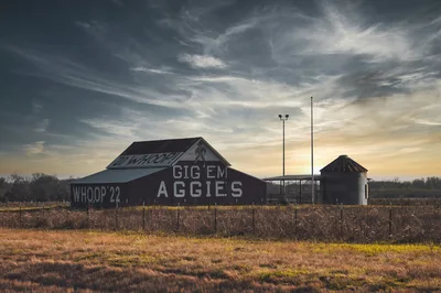 The iconic Aggie Barn in Texas with slogans like 'Gig 'em Aggies' and 'Whoop'