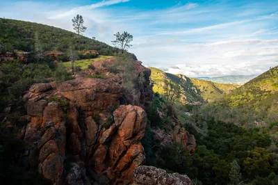 Breathtaking aerial view of rugged cliffs and lush valleys in Pinnacles National Park near Hollister, California