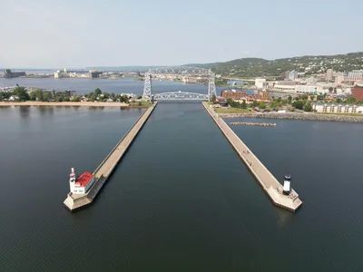 Aerial view of Duluth harbor and the iconic Aerial Lift Bridge on a clear day
