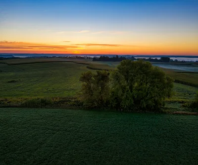 Aerial sunset view of flat farmland in the Upper Midwest near Fargo