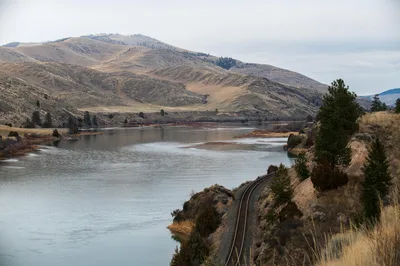Aerial view of the Missouri River winding through the rugged Montana landscape near Great Falls