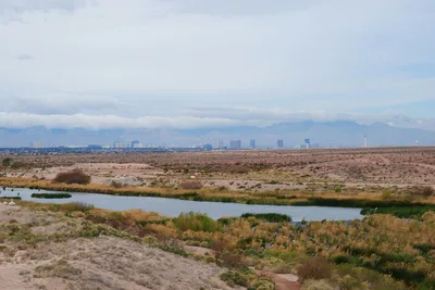 Aerial view of the Henderson desert landscape with the Las Vegas skyline in the distance