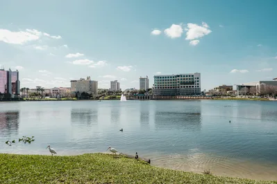 Aerial view of Lake Mirror and the Lakeland skyline featuring the historic Terrace Hotel