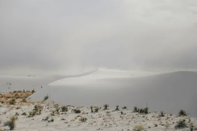 Wide aerial-style view of the iconic white sand dunes at White Sands National Park near Las Cruces, New Mexico