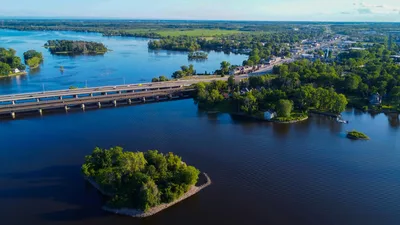 Aerial shot of Vaudreuil-Dorion, QC, Canada with bridge and river view.