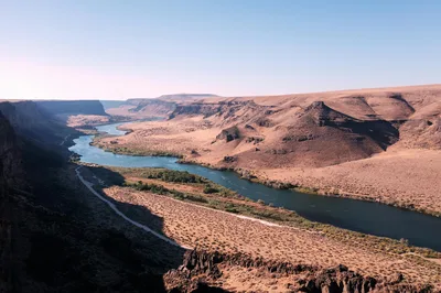 Aerial view of a winding river through a rugged canyon near Boise and Nampa, Idaho.