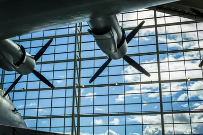 Close-up of vintage airplane propellers against a bright blue sky at the Evergreen Aviation & Space Museum in McMinnville, Oregon.