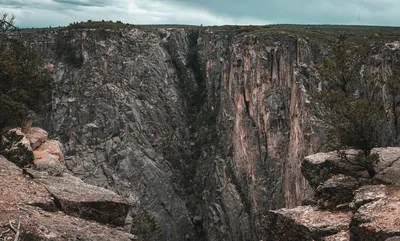 Aerial view of the rugged cliffs and dramatic landscape of Black Canyon of the Gunnison near Montrose, Colorado.