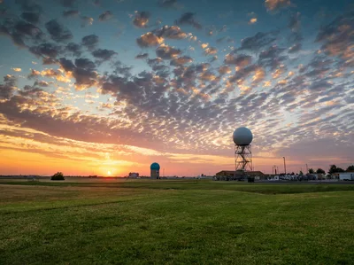 Dramatic sunset over a weather radar station in Norman, Oklahoma