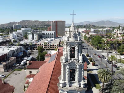 Aerial view of the historic skyline of downtown Riverside, California featuring the Mission Inn area.