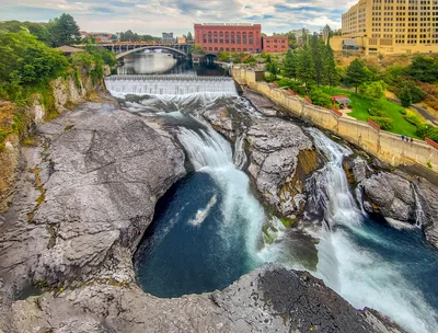 Aerial view of the Spokane River and downtown falls, showcasing the landscape typical of a pilot's approach to Felts Field.