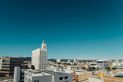 Aerial view of Santa Monica city skyline on a bright day with clear blue skies