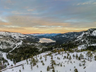Aerial sunset view of Donner Lake and the Sierra Nevada mountains near Truckee-Tahoe Airport