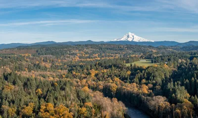 Aerial-style view of Mount Hood and the forested landscape near Sandy and Troutdale, Oregon.