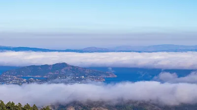 Aerial view of fog enveloping San Francisco Bay and the North Bay hills